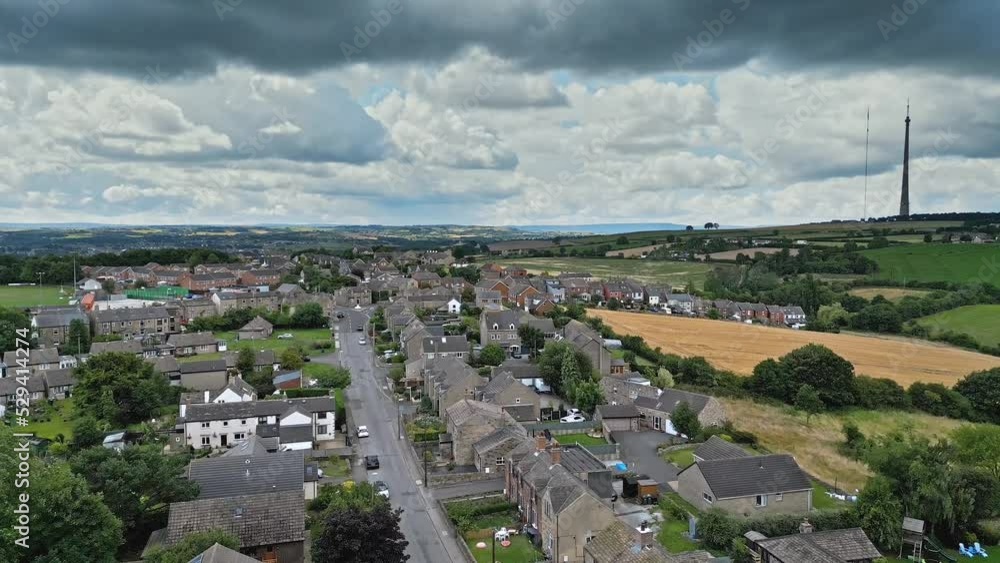 Traditional English village scene. Aerial footage of village houses in