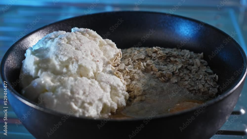 Making Healthy Meal Chicken And Oatmeal With Ingredients In A Bowl. close up Making Healthy Meal Chicken And Oatmeal With Ingredients In A Bowl. close up