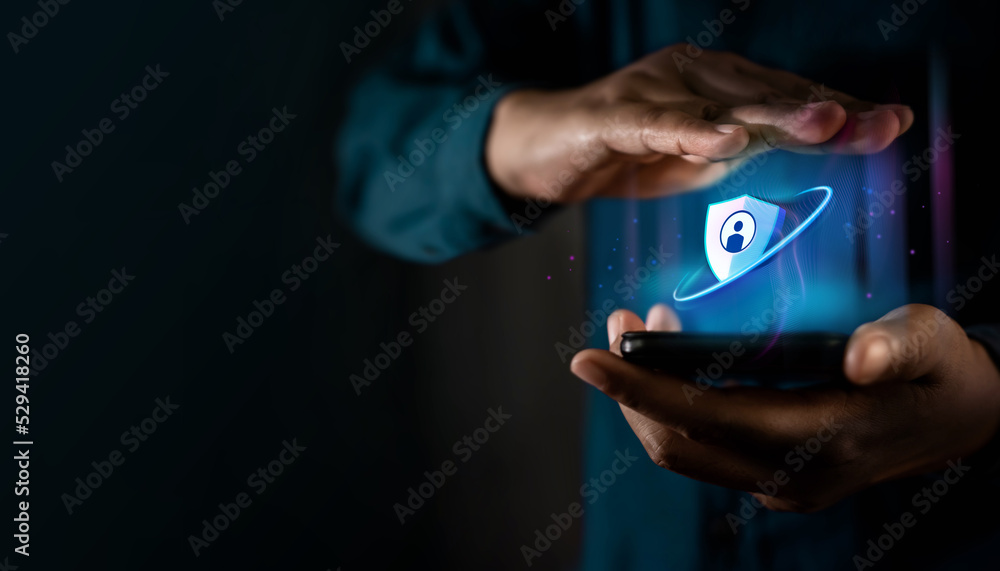Cyber Security and Privacy on New Technology Concept. Web3 Securing Cloud Computing Online Systems. Hand Holding Smart Phone with Padlock and Protect Guard Shield Cyber Security and Privacy on New Technology Concept. Web3 Securing Cloud Computing Online Systems. Hand Holding Smart Phone with Padlock and Protect Guard Shield
