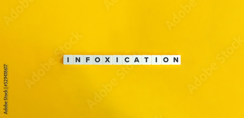 Infoxication (Information Overload) Word and Banner. Letter Tiles on Yellow Background. Minimal Aesthetics. photo