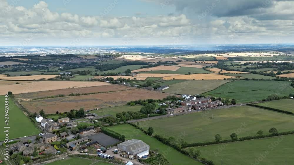 Traditional English village scene. Aerial footage of village houses in ...
