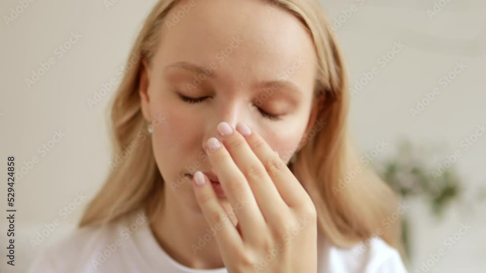 Stressed unhealthy woman feeling tired have terrible strong headache pain. Female suffering from migraine massaging head. Stressed unhealthy woman feeling tired have terrible strong headache pain. Female suffering from migraine massaging head.