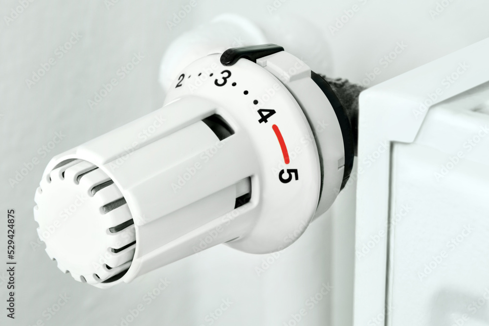 White heater and thermostat 3 close up White heater and thermostat 3 close up