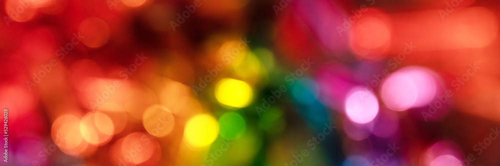 Blurred bokeh background for Christmas and New Year holiday. Abstract colorful wallpaper with defocused lights. Copy space. Banner Blurred bokeh background for Christmas and New Year holiday. Abstract colorful wallpaper with defocused lights. Copy space. Banner