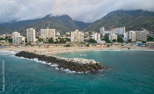 Aerial view picturesque public beach with turquoise water. Los Corales, La Guaira, Venezuela photo