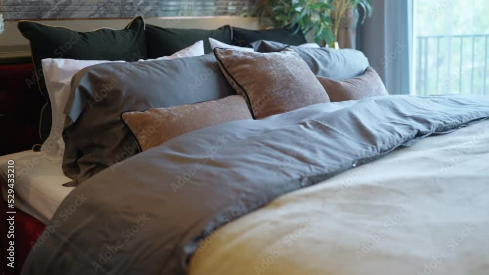 dolly shot of close up soft pillow arrange set on king size bed with nature sun light from window,bedroom pillow house design interior ideas background of contemporary home decorative detail dolly shot of close up soft pillow arrange set on king size bed with nature sun light from window,bedroom pillow house design interior ideas background of contemporary home decorative detail