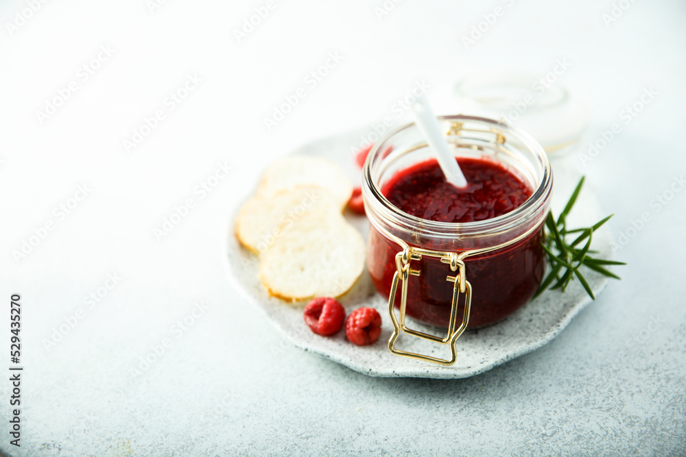 Raspberry jam or sauce with fresh rosemary Raspberry jam or sauce with fresh rosemary