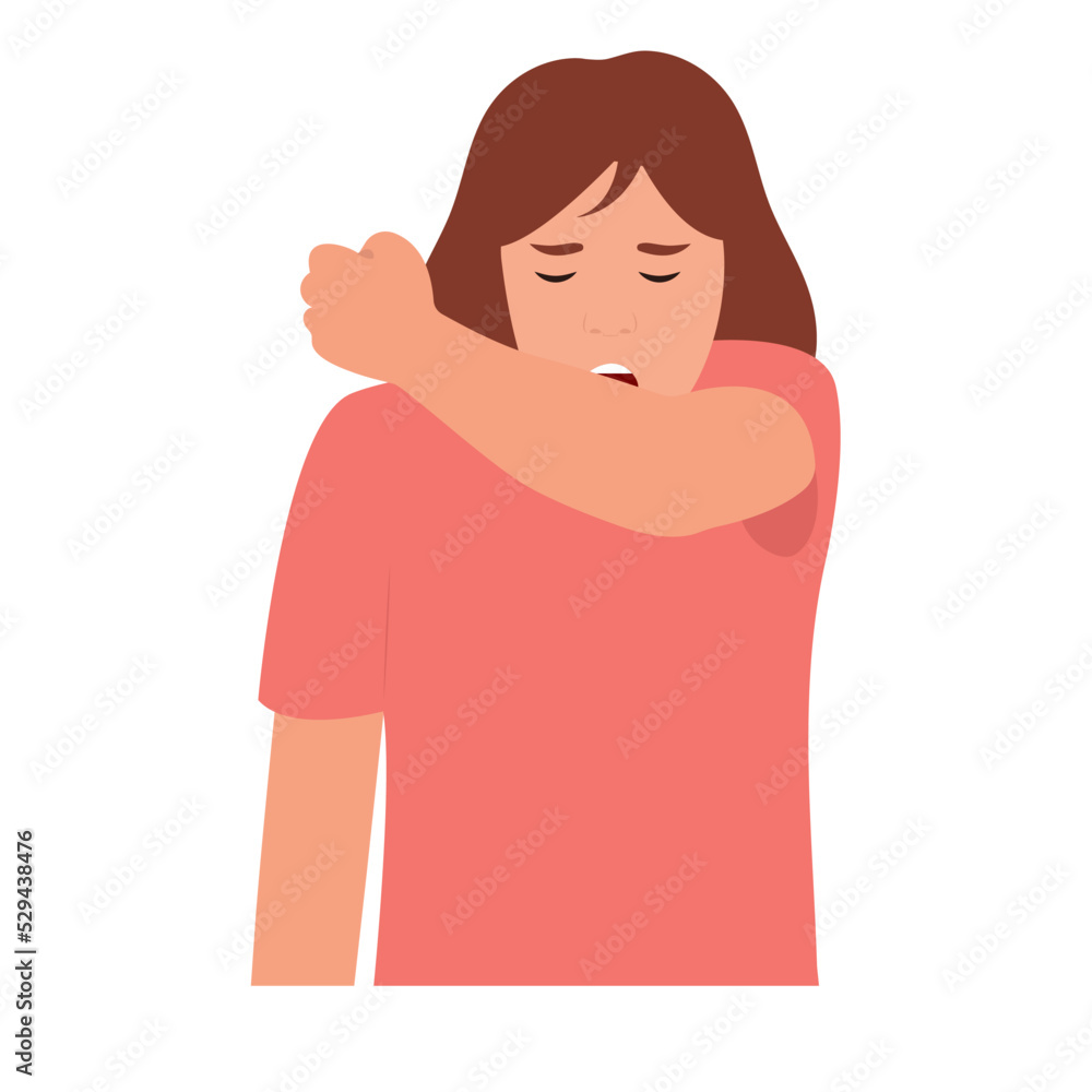 Fototapeta premium A young woman is sneezing into the elbow by an allergy or a cold.Isolated on white background