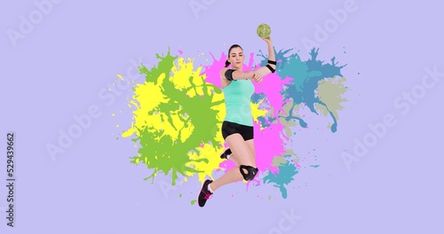 Caucasian female handball player throwing ball with colorful patterns against violet background