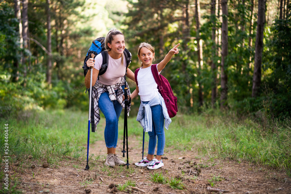 Fototapeta premium Mother and daughter enjoy hiking together.