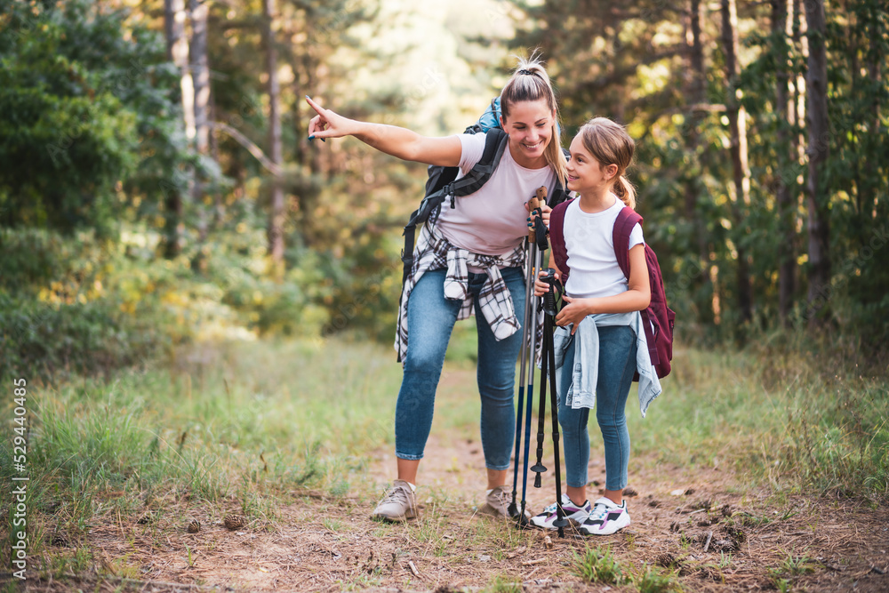 Fototapeta premium Mother and daughter enjoy hiking together.