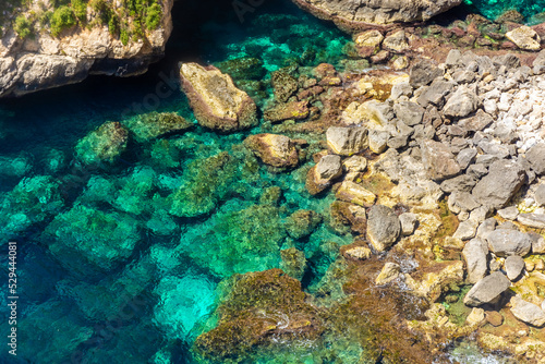 Crystal clear water in the Blue Grotto of Malta