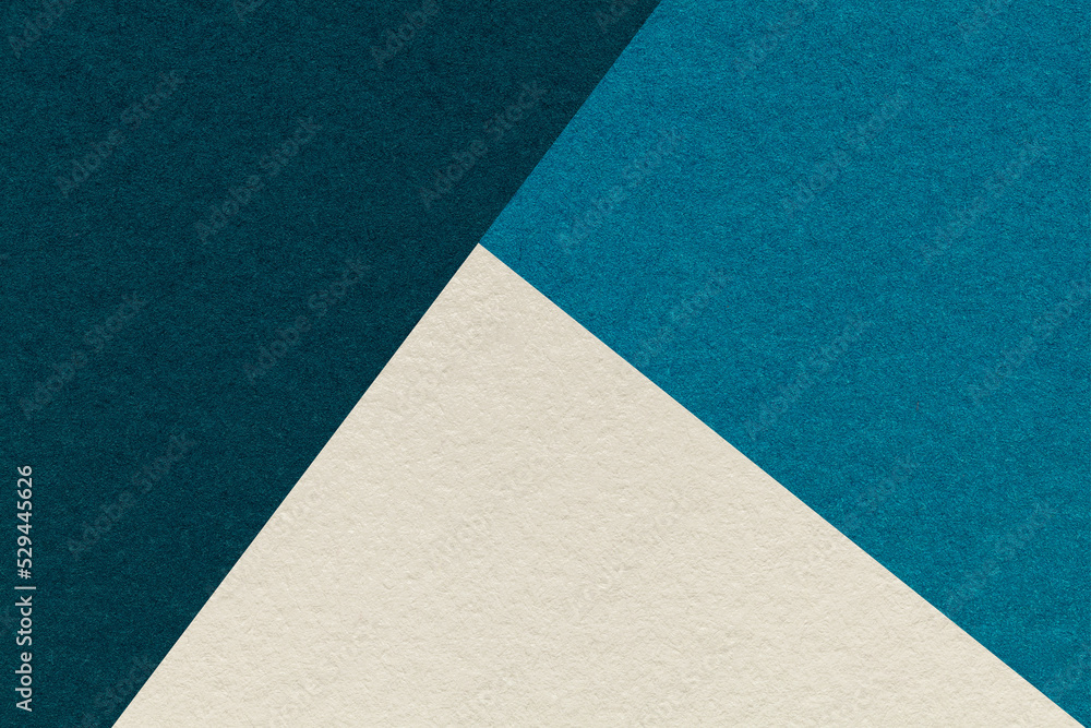 Texture of craft navy blue, cerulean and beige shade color paper background, macro. Vintage abstract cardboard. Texture of craft navy blue, cerulean and beige shade color paper background, macro. Vintage abstract cardboard.