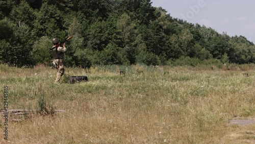 An Ukrainian serviceman prepares the Precision Shoulder-Fired Rocket Launcher, PSRL-1, as he prepares to fire it. photo