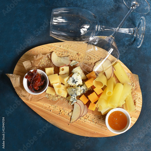 cheese plate glasses honey apples sun-dried tomatoes parmesan