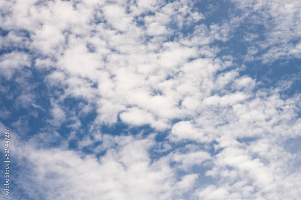 Clear blue sky background with clouds at the ocean. Copy space Clear blue sky background with clouds at the ocean. Copy space