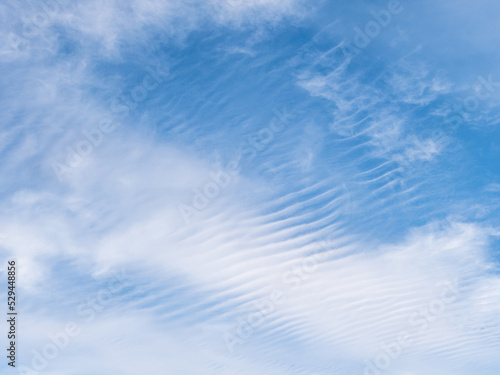 Empty blue sky with a cirrus clouds