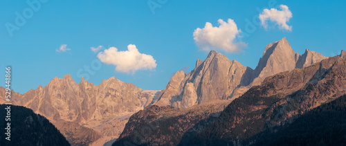 The Piz Badile, Pizzo Cengalo, and Sciora peaks in the Bregaglia range - Switzerland in evening light.