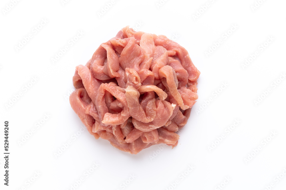 Raw chicken fillet. Small pieces of meat isolated on white. Raw chicken fillet. Small pieces of meat isolated on white.