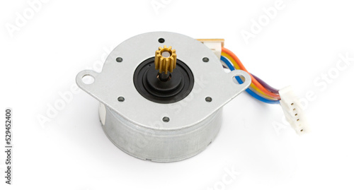 Electronic stepper motor with colorful wires on a white background. Macro photo. Background picture. photo
