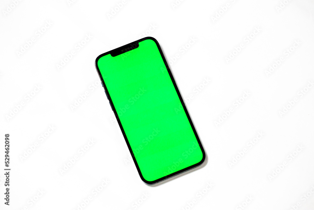 Smartphone with blank green screen isolated on white background. Smartphone with blank green screen isolated on white background.