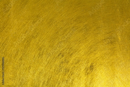 Gold leaf or gold foil like texture.  Brushed gold texture.  photo