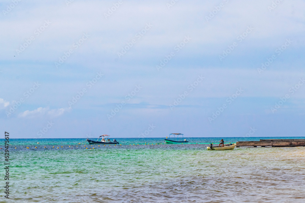 Boats yachts ship jetty beach in Playa del Carmen Mexico. Boats yachts ship jetty beach in Playa del Carmen Mexico.