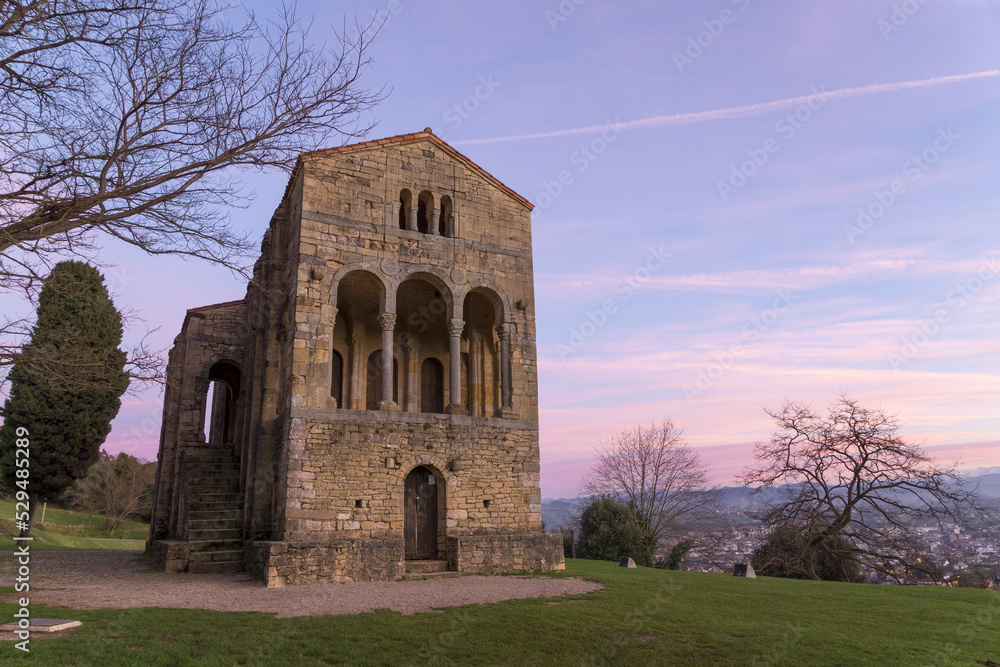 View of the church of St Mary at Mount Naranco at sunset. Oviedo, Asturias, Spain. Europe