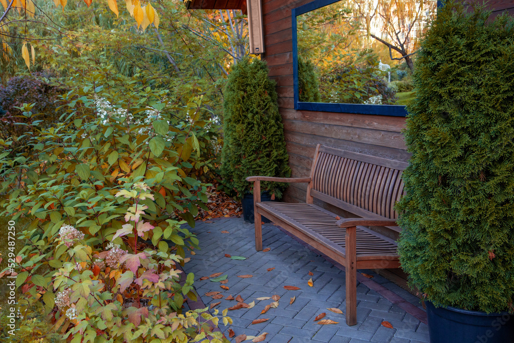 Secluded bench in the autumn park.