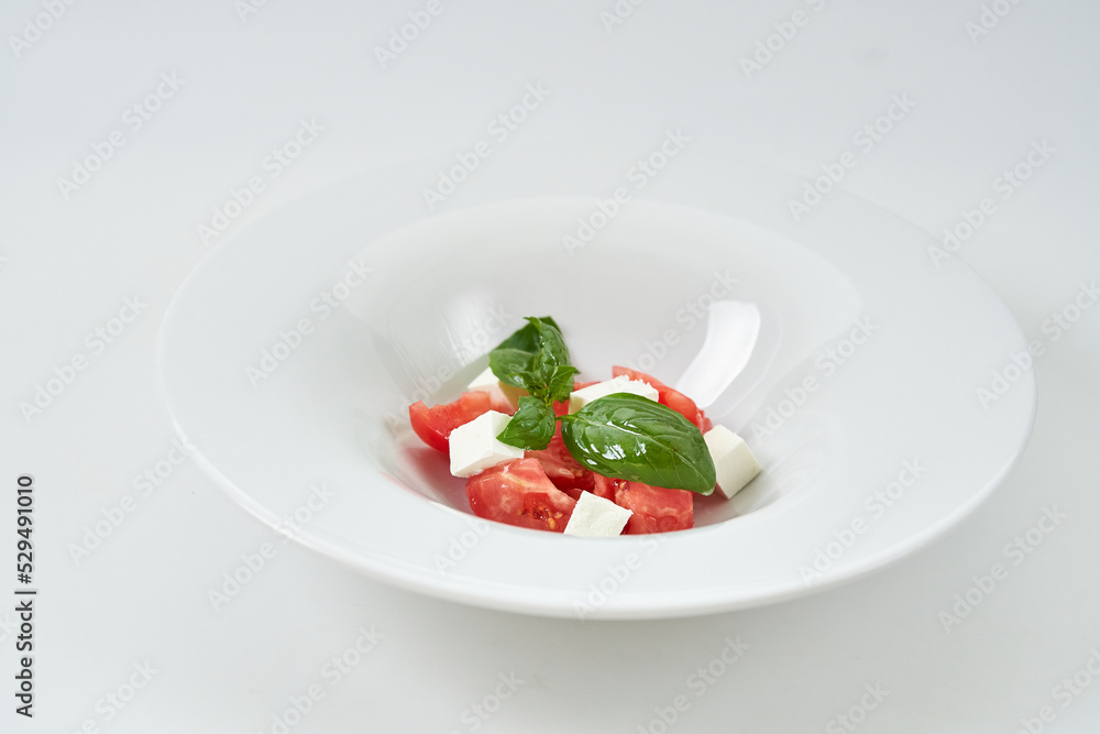 light salad with tomatoes and cheese light salad with tomatoes and cheese