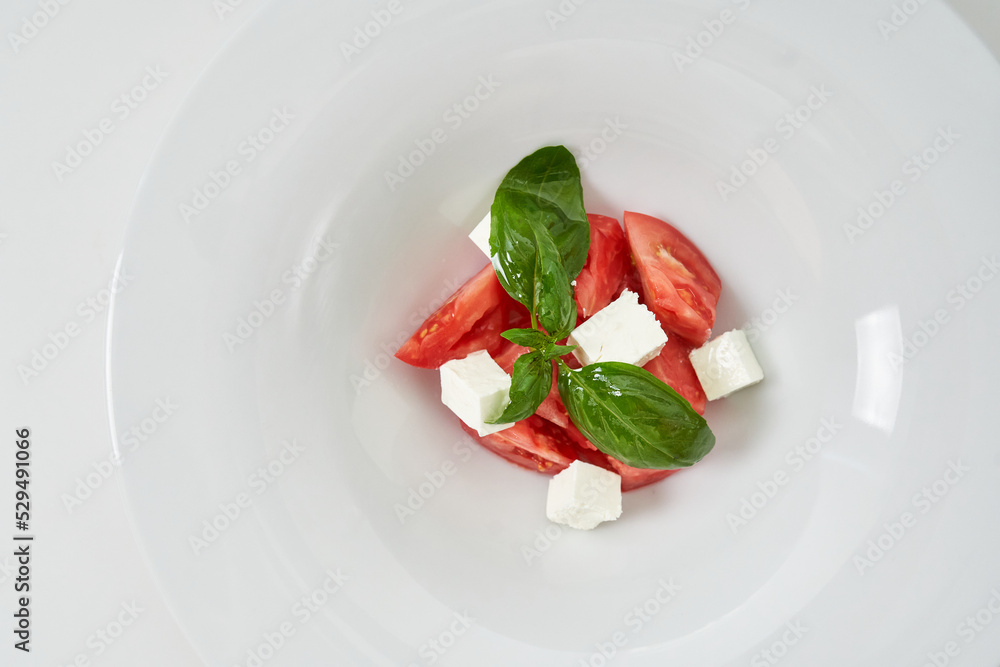 light salad with tomatoes and cheese light salad with tomatoes and cheese