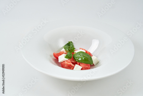 light salad with tomatoes and cheese