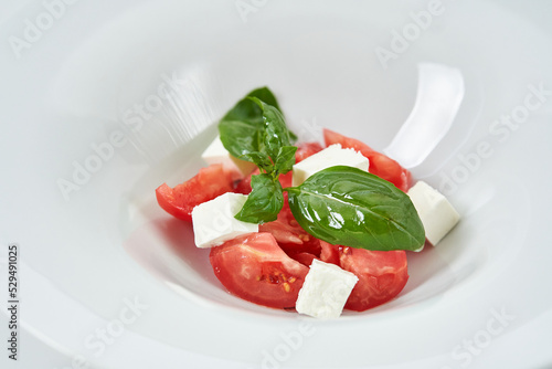 light salad with tomatoes and cheese