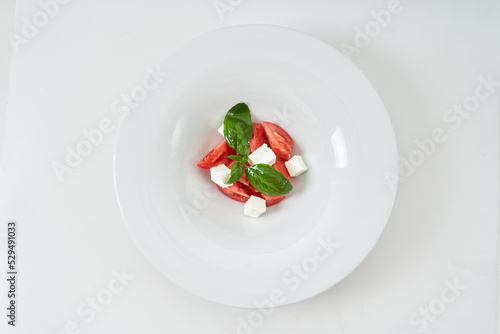 light salad with tomatoes and cheese