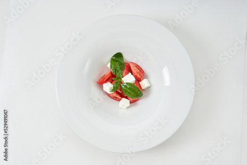 light salad with tomatoes and cheese