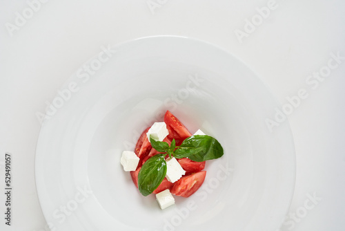 light salad with tomatoes and cheese