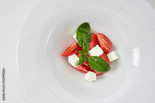 light salad with tomatoes and cheese