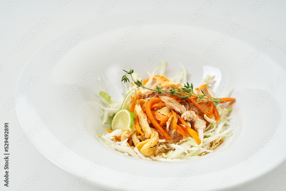 salad with vegetables and fruits. cabbage, markov, apple, lemon. dressing olive oil with lemon and mustard salad with vegetables and fruits. cabbage, markov, apple, lemon. dressing olive oil with lemon and mustard