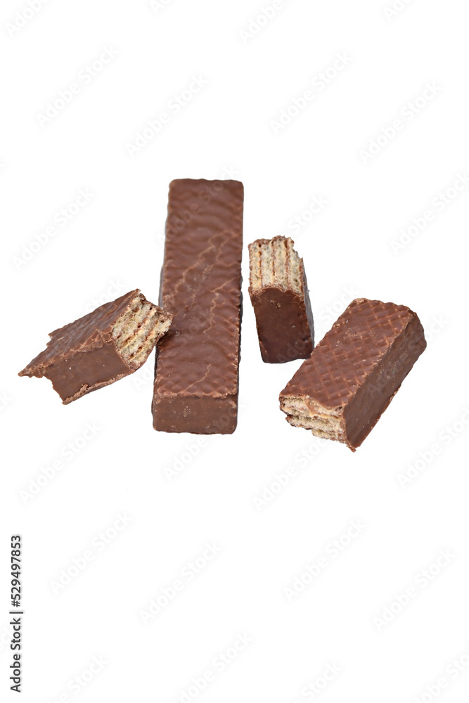 closeup the bunch dark brown color snack chocolate block soft focus natural white brown background. closeup the bunch dark brown color snack chocolate block soft focus natural white brown background.