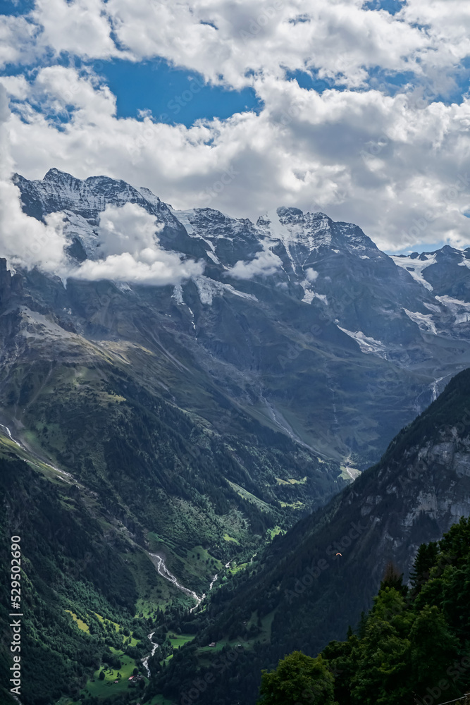 Alpine landscape, a famous valley in Switzerland. Lauterbrunnen valley 72 waterfalls, the place that was inspired by Tolkien Alpine landscape, a famous valley in Switzerland. Lauterbrunnen valley 72 waterfalls, the place that was inspired by Tolkien