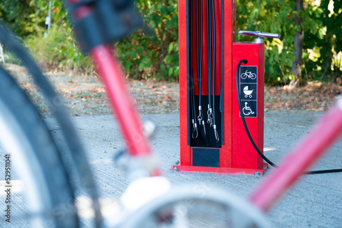 bicycle station with air pump and tools for repairing bikes