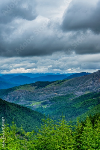 View. of the mountain ridge of northern cascades and Snoqualmie pass from Mt, Rainer national park with storm clouds © Buvaneshwari