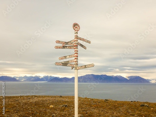 Mileage signpost at Pond Inlet, Baffin Island, Canada.