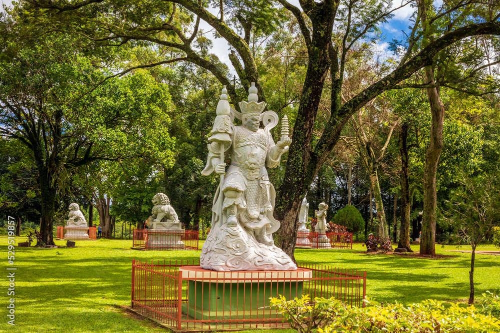 Guardian sculptures in the Buddhist temple garden