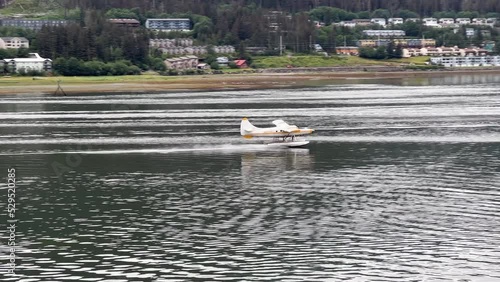 Sea plane landing in Juneau, Alaska in summer.
