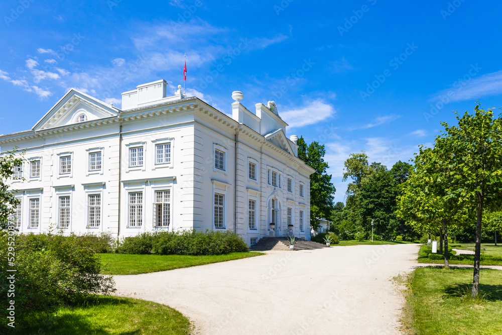 Uzutrakis manor. Colonnaded mansion set in landscaped gardens. Trakai, Lithuania, 2 July 2022