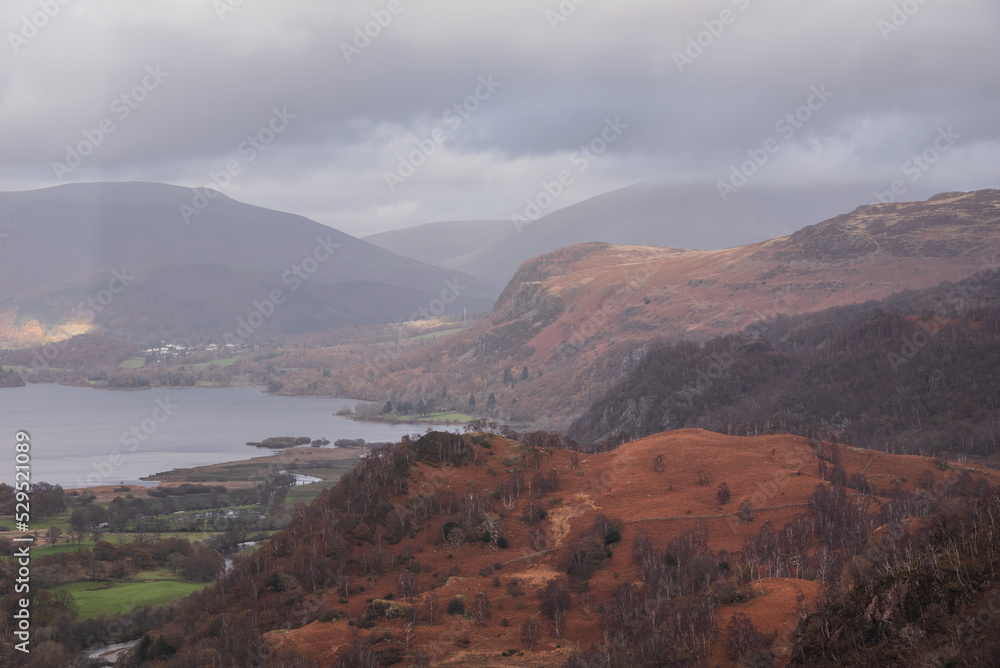 Stunning landscape image of the view from Castle Crag towards Derwentwater, Keswick, Skiddaw, Blencathra and Walla Crag in the Lake District