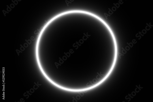 White glowing circle on a black empty background