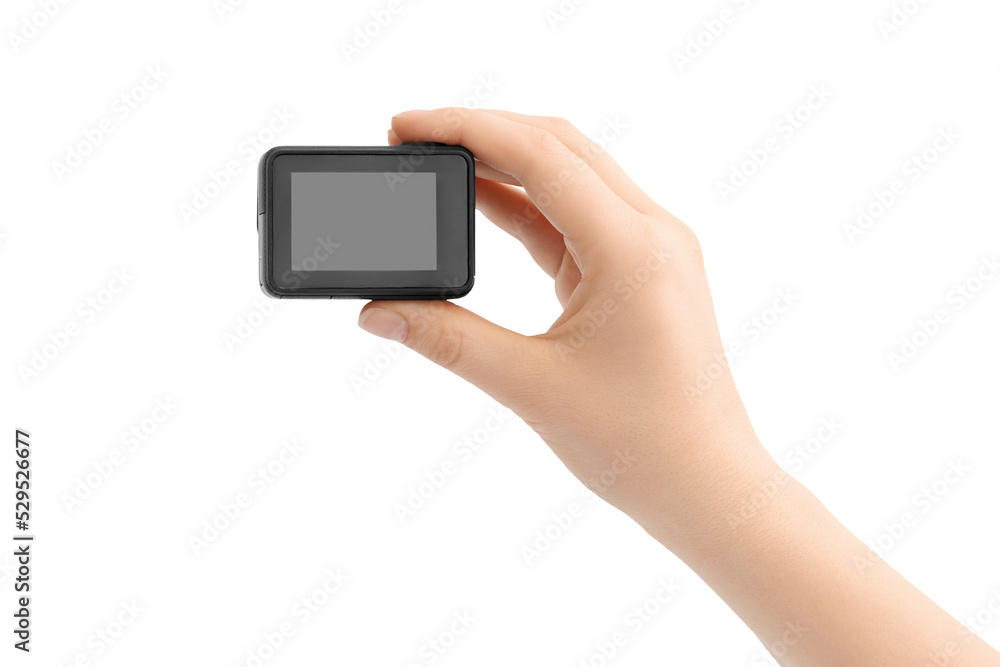 Action camera in hand isolated on white. Blank screen for mockup. Action camera in hand isolated on white. Blank screen for mockup.