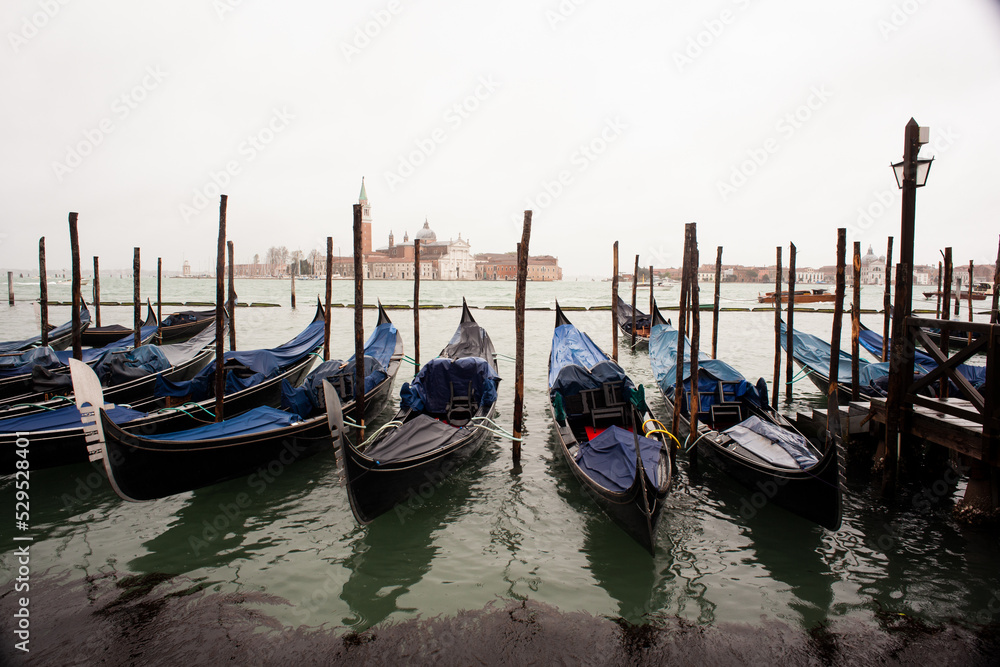 Fototapeta premium Gondolas parking in the traditional Venetian rowing boat